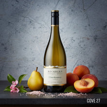 Load image into Gallery viewer, Bottle of Rockburn Chardonnay white wine with fruits and flowers on a gray surface