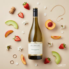 Load image into Gallery viewer, Rockburn Chardonnay white wine bottle surrounded by fruits and flowers on a beige background