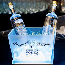 Load image into Gallery viewer, Two bottles of Royal Dragon Superior Vodka in an ice bucket with a blurred background.