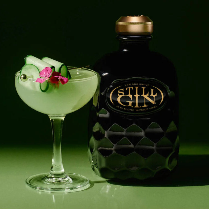 Still Gin West Coast Wildflowers bottle with a cocktail on a green background
