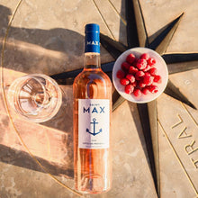 Load image into Gallery viewer, Bottle of Saint Max rosé wine with a glass and berries on a stone surface
