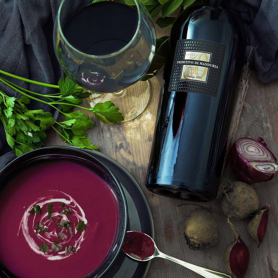 Load image into Gallery viewer, A bottle of San Marzano Sessantanni Primitivo next to a bowl of soup