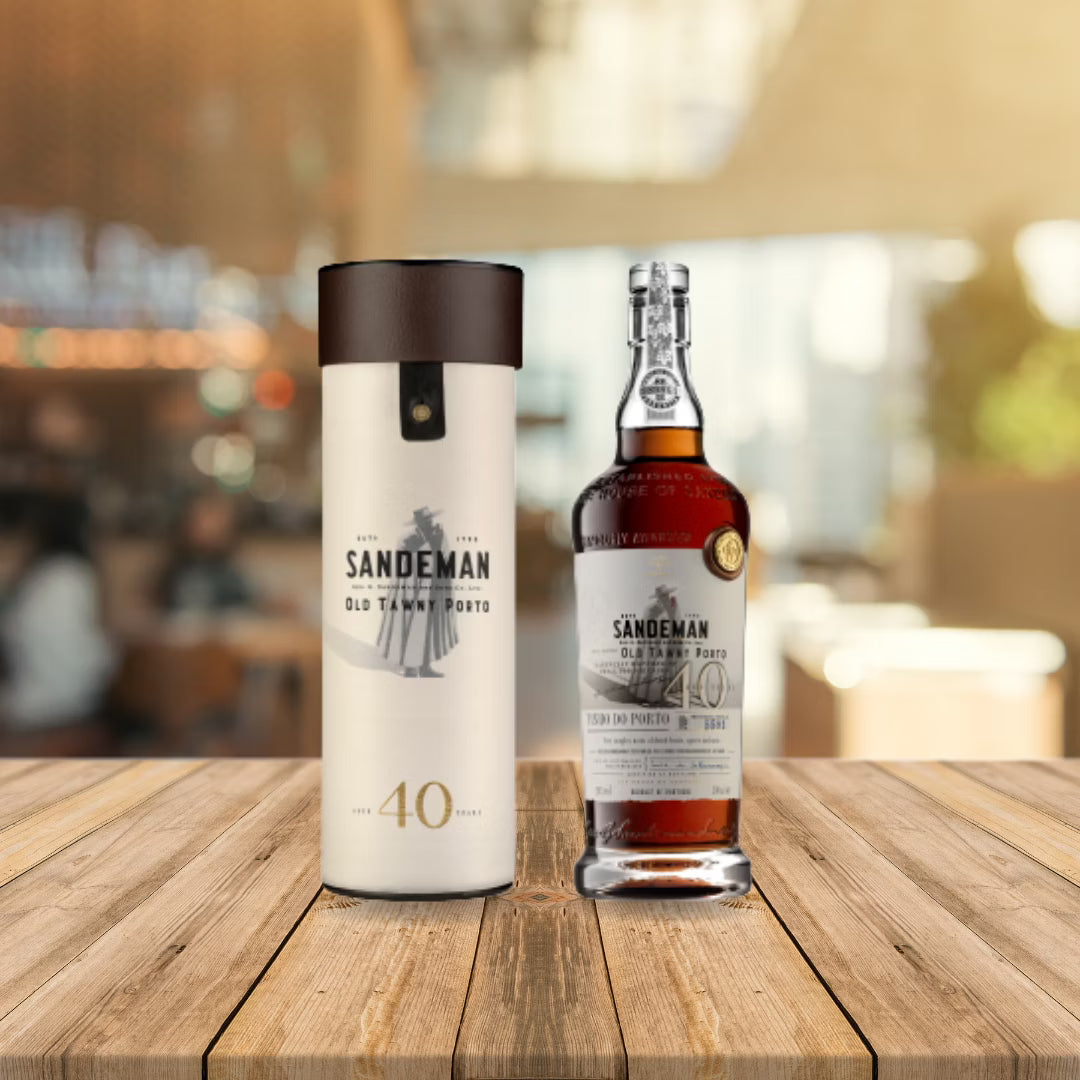 Load image into Gallery viewer, Sandeman whiskey bottle and canister on a wooden surface with a blurred background