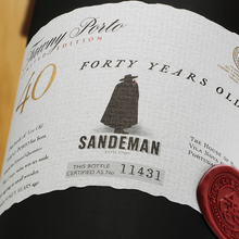 Load image into Gallery viewer, Sandeman Porto label on a bottle, featuring text and a silhouette of a person in a cloak.