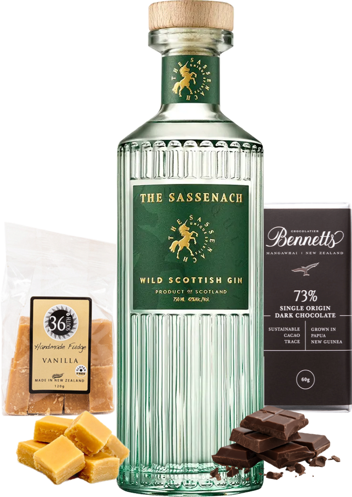 A bottle of The Sassenach Wild Scottish Gin centered on a white background, surrounded by product ingredients: a bag of 36 Degrees Vanilla handcrafted fudge, several vanilla fudge cubes, and a box of Bennett's 73% Single Origin Dark Chocolate with chocolate pieces scattered in front.