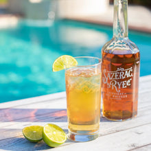 Load image into Gallery viewer, A bottle of Whiskey and cocktail by the pool.