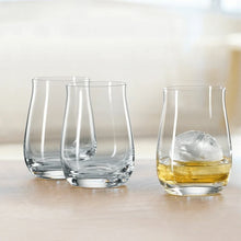 Load image into Gallery viewer, Three clear glasses on a light surface with one containing a small ice cube and liquid.
