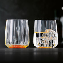 Load image into Gallery viewer, Two clear glasses with ice cubes on a dark background