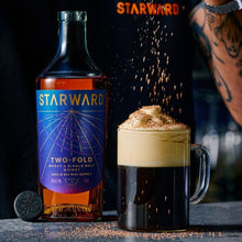 Load image into Gallery viewer, Starward Two-Fold whiskey bottle with a cocktail on a dark background