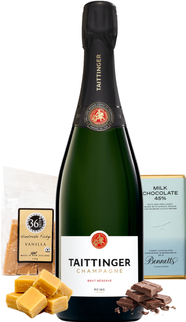 Load image into Gallery viewer, Bottle of Taittinger champagne with milk chocolate and vanilla fudge on a white background