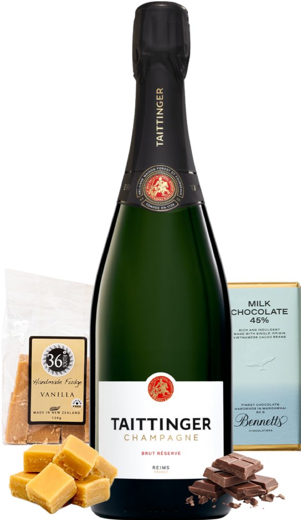 Bottle of Taittinger champagne with milk chocolate and vanilla fudge on a white background