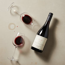 Load image into Gallery viewer, Wine bottle and two glasses of Tantalus-Regional-Pinot-Noir wine on a textured surface