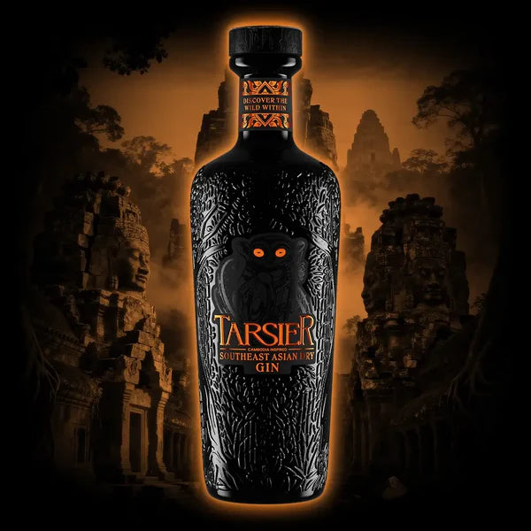 Load image into Gallery viewer, Bottle of Tarsier Southeast Asian DRY Gin with ancient temple background