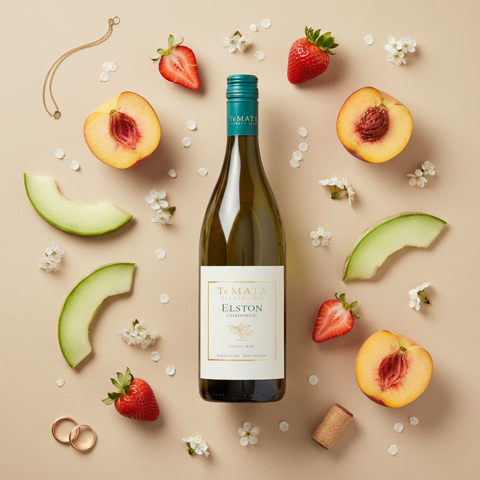 Load image into Gallery viewer, A bottle of Te Mata Elston Chardonnay wine surrounded by summer fruits