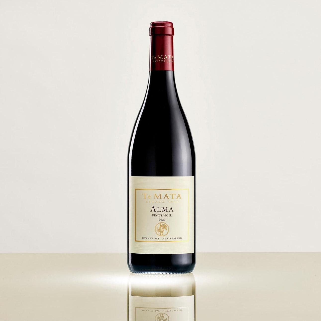 Load image into Gallery viewer, Te-Mata-Estate-Alma-Pinot-Noir bottle on a reflective surface