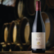 Load image into Gallery viewer, Wine bottle with &#39;Alma&#39; label in a wine cellar setting
