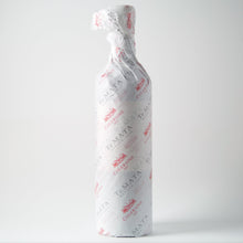 Load image into Gallery viewer, Te-Mata-Estate-Coleraine bottle wrapped in branded paper on a white background
