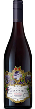 Load image into Gallery viewer, A bottle of Terra Sancta Pinot Noir wine with a label that features an illustration of a castle and a vineyard under a Christmas tree.