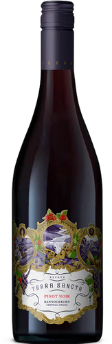 A bottle of Terra Sancta Pinot Noir wine with a label that features an illustration of a castle and a vineyard under a Christmas tree.