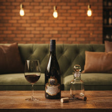 Load image into Gallery viewer, Terra-Sancta-Estate-Jacksons-Block-Pinot-Noir wine bottle, glass, and decanter on a wooden table with a cozy background.