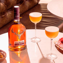 Load image into Gallery viewer, Dalmore 12 year old whisky bottle with two cocktails on a table