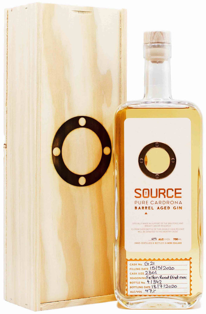 An image of a bottle of Cardrona 'The Source' Bourbon Barrel Aged Gin next to it's wooden gift box