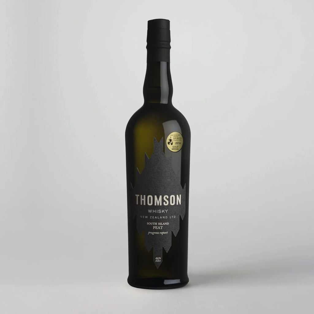 Thomson Peated whisky bottle on a white background