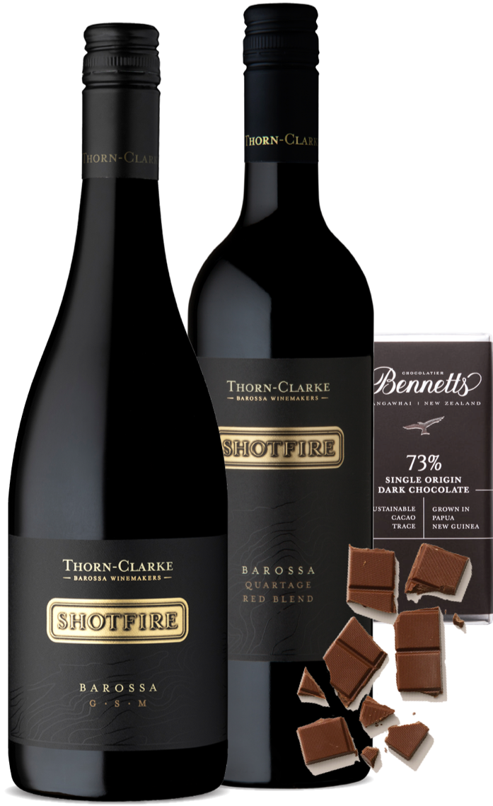 An image of the Thorn-Clarke Shotfire Red Wine Gift Box, including 2 bottles of delicious red wines and a bar of hand-made Bennetts Dark Chocolate