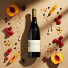 Load image into Gallery viewer, Torbreck-Struie-Barossa-Shiraz wine bottle with fruit and jewelry on a beige background