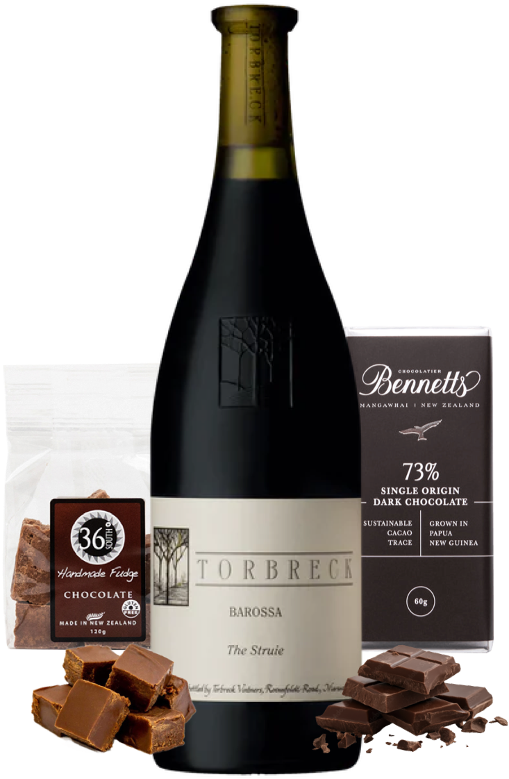 Load image into Gallery viewer, A bottle of Torbreck 'The Struie' Barossa Shiraz red wine centred on a white background, surrounded by chocolate products including a bag of 36 Degrees Handmade chocolate fudge, a bar of Bennett's 73% single origin dark chocolate, and scattered chocolate pieces.