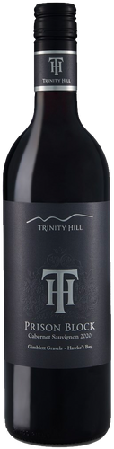 A bottle of Trinity Hill 'Prison Block' Cabernet Sauvignon with a dark label featuring a white 'T' and 'Trinity Hill' text, against a plain background.