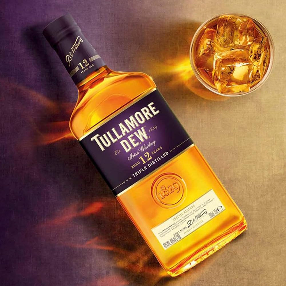 Load image into Gallery viewer, Whiskey bottle with a glass of whiskey on a gradient background