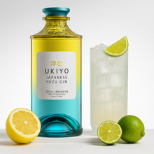 Load image into Gallery viewer, Bottle of Ukiyo Japanese Yuzu Gin with a cocktail and citrus fruits on a white background