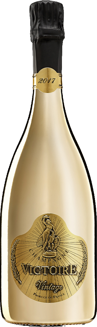 Load image into Gallery viewer, A gold bottle of Victoire Fût de Chêne Prestige Champagne with a metallic gold foil label, a black cork, and a gold foil seal marked 2017, isolated on a white background.