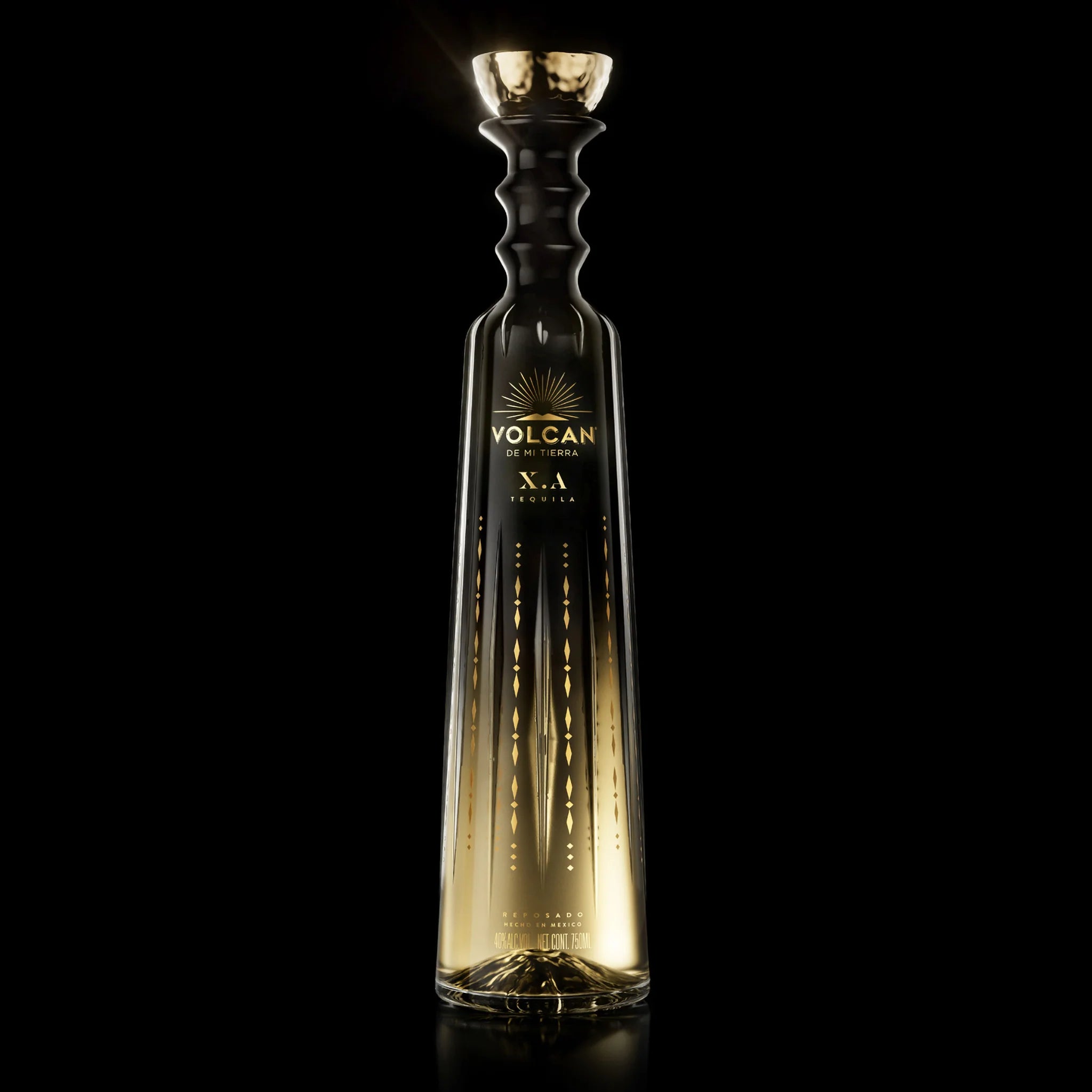 Load image into Gallery viewer, A bottle of Volcán de mi Tierra X.A Tequila on a black background