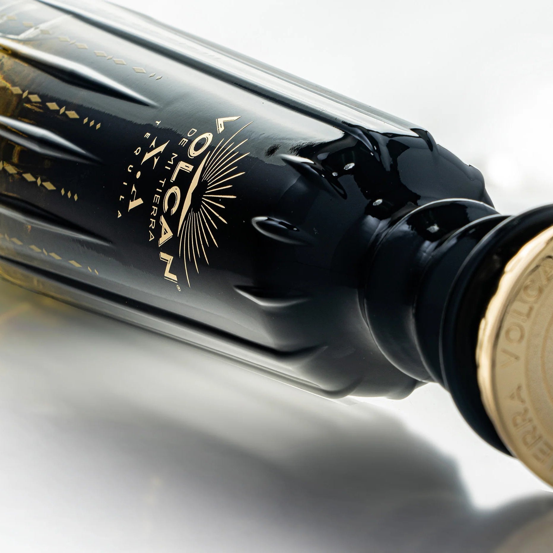 Load image into Gallery viewer, A bottle of Volcán de mi Tierra X.A Tequila on a white background