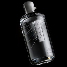 Load image into Gallery viewer, X Muse vodka bottle on a black background