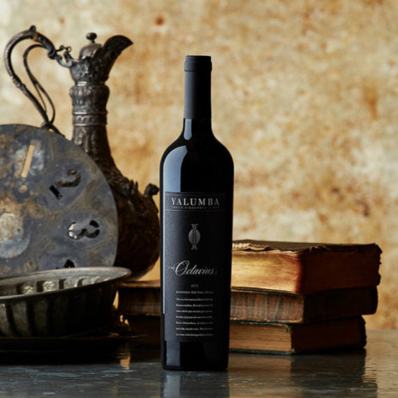 Yalumba Rare and Fine The Octavius shiraz bottle on a wooden surface with rustic background