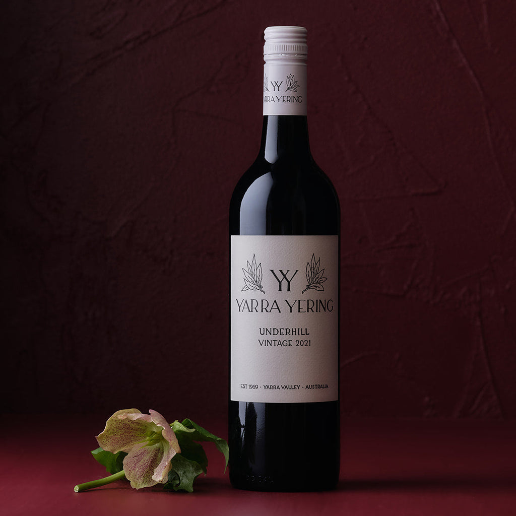 Yarra-Yering-Underhill-Shiraz bottle with a label on a dark red background