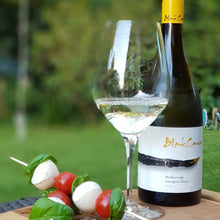 Load image into Gallery viewer, A bottle of Blank Canvas Holdaway Sauvignon Blanc and some mozarella, tomatoes and basil kebabs