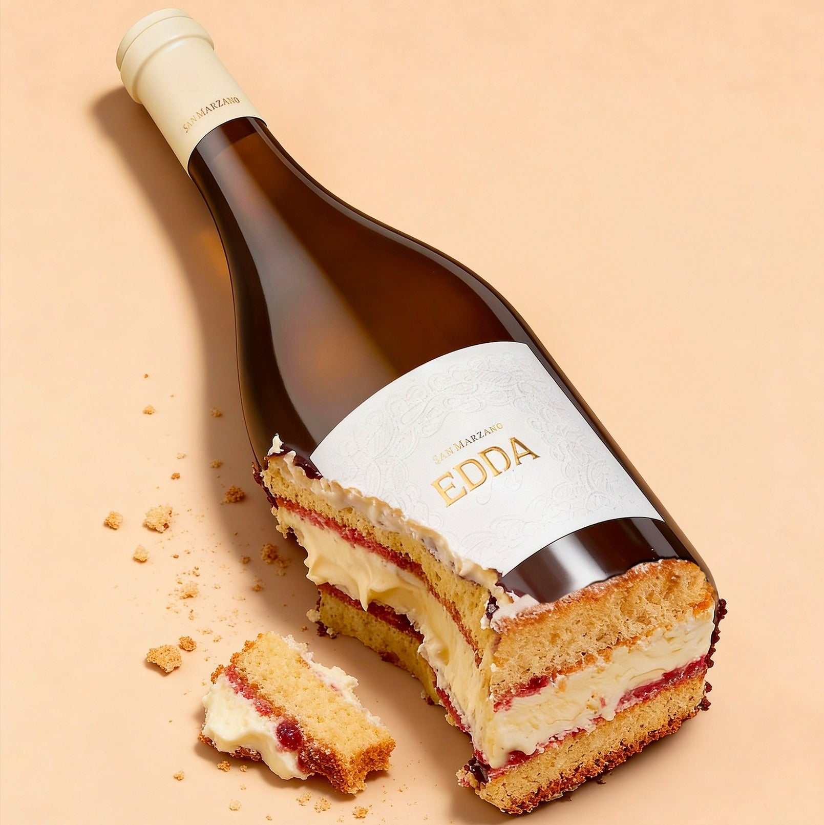 Load image into Gallery viewer, Bottle of EDDA wine with a slice of cake on a beige background