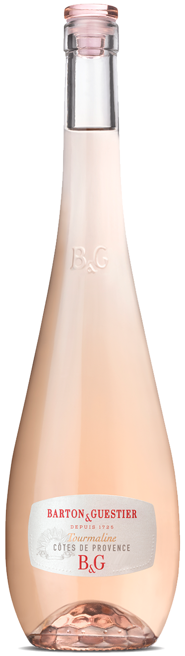 Bottle of Barton Guestier Provence Rosé wine with a pink hue and a label that includes the brand name and variety.