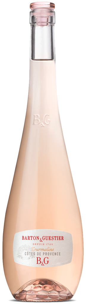 Bottle of Barton Guestier Provence Rosé wine with a pink hue and a label that includes the brand name and variety.