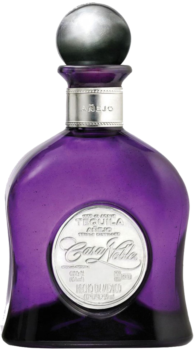 An image of a stunning purple bottle of Casa Noble Añejo Tequila, partially own by legendary guitarist Carlos Santana