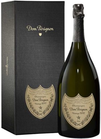 An image of a bottle of Dom Pérignon Champagne next to its stunning gift box. This is one of world's most famous premium Champagnes