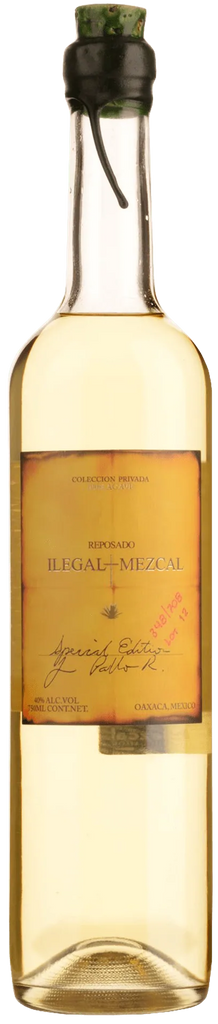 An image of a bottle of Ilegal Mezcal Reposado from Oaxaca in Mexico with its handsome wax sealed cork stopper.