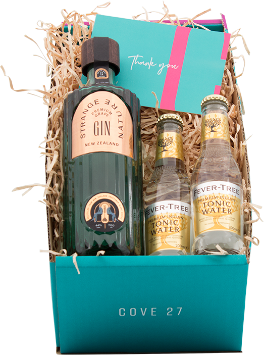 An image of a beautiful and uniquely Kiwi Strange Nature Gin that's been infused with New Zealand Sauvignon Blanc plus two Fever-Tree Indian Tonic waters beside to compliment this stunning gin, all inside a COVE 27 gift box and thank you card