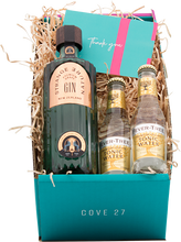 Load image into Gallery viewer, An image of a beautiful and uniquely Kiwi Strange Nature Gin that&#39;s been infused with New Zealand Sauvignon Blanc plus two Fever-Tree Indian Tonic waters beside to compliment this stunning gin, all inside a COVE 27 gift box and thank you card